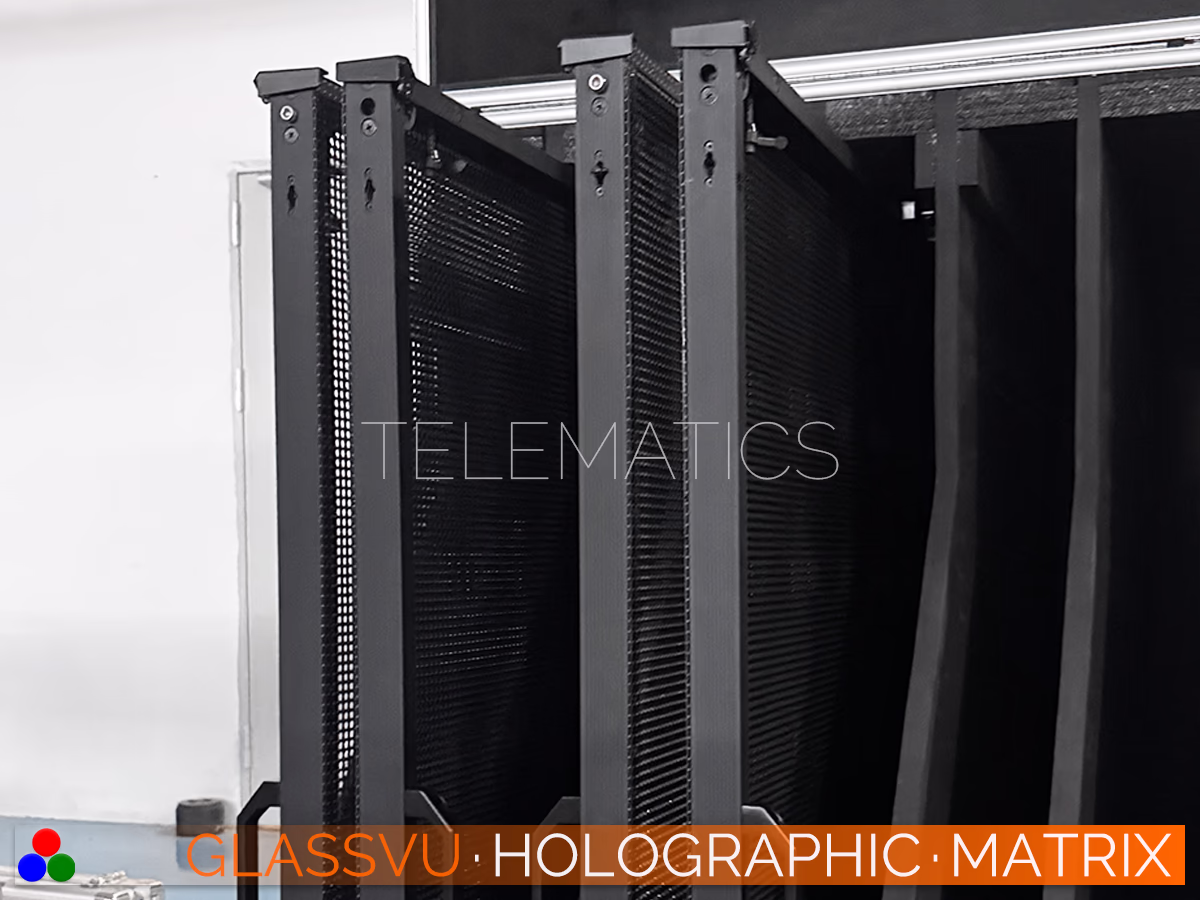 GlassVu Holographic Matrix transparent LED screens stored vertically in custom transport racking functioning as a highly portable and protective solution for mobile event digital signage.