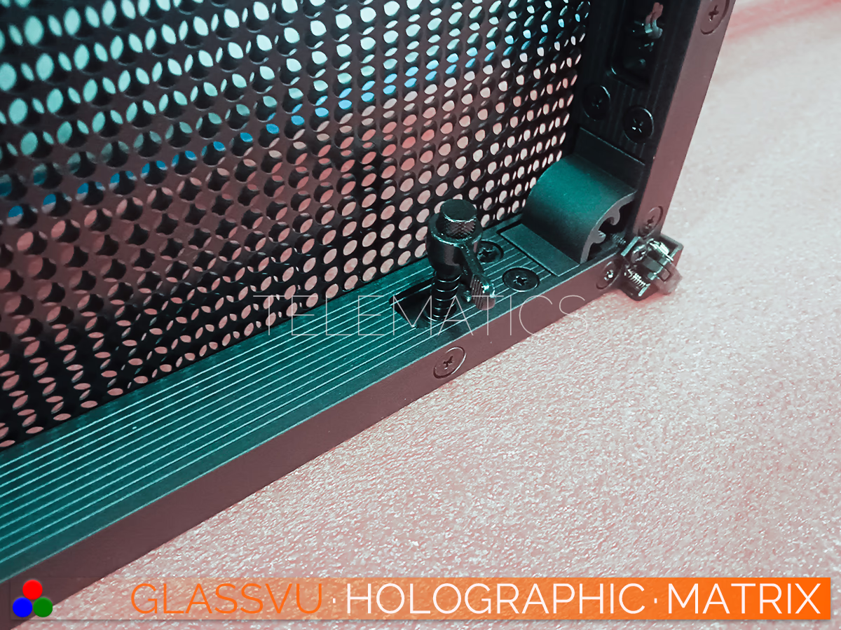 The Art Of Light · GlassVu Matrix · Telematics Canada Detailed view of the GlassVu Matrix LED panel frame, featuring a secure spring-loaded locking pin mechanism for fast and reliable stage assembly.